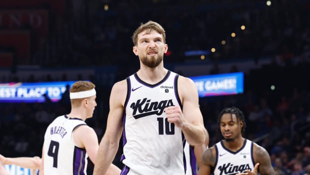 Feb 11, 2024; Oklahoma City, Oklahoma, USA; Sacramento Kings forward Domantas Sabonis (10) reacts after a play against the Oklahoma City Thunder during the second quarter at Paycom Center. Mandatory Credit: Alonzo Adams-USA TODAY Sports  